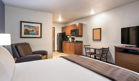 Unwind in a spacious studio with kitchenette and dining nook.
