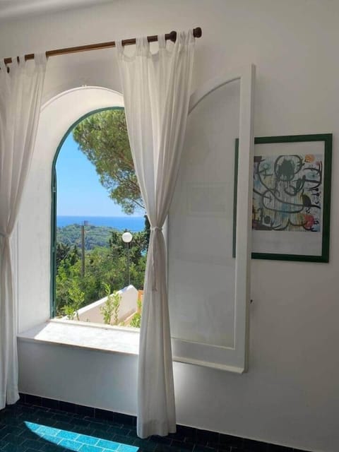 Casa Agave Torre Bianca in Gaeta with sea views and direct access to the villa's outdoor spaces.