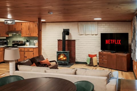 Cozy living space with a 65" smart TV and an inviting gas fireplace you can turn on with a simple switch. Perfect for movie nights after a day in the mountains.