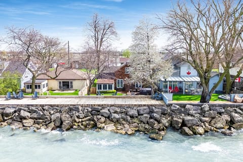 From right to left: Aerial view of three side-by-side from right to left: Peaceful Point, Kingfisher Lake House, Drifter`s Landing