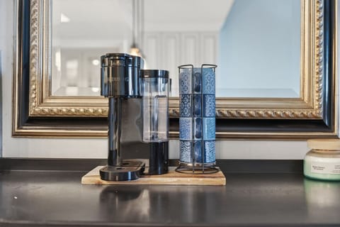 Coffee station detail w/ espresso machine & glassware, perfect for slow mornings or afternoon pick-me-ups.