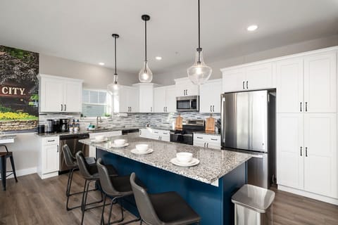 Coffee, snacks, and big family dinners are easy in this bright, beautiful kitchen!