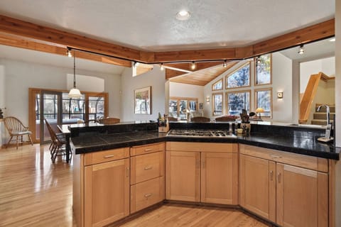 Kitchen looking to dining room and living room

