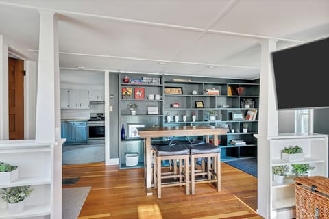 Open dining room with a view of the yard