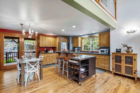 Seating for the whole group. A dining table for four plus a kitchen bar that seats two.
