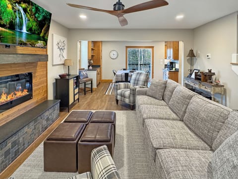 Cozy up to the glow of our sleek electric fireplace for movie night.