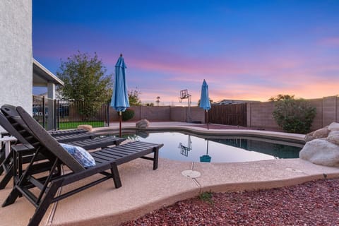 Heated pool with sunset views — your own backyard oasis.