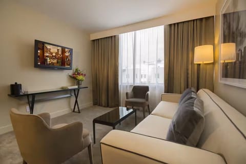 Relax at dusk with cozy seating and soft ambient light.