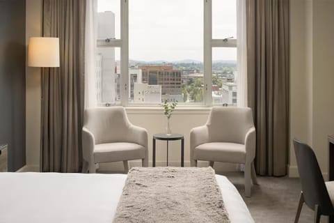 Sip morning coffee by the window and watch the city.