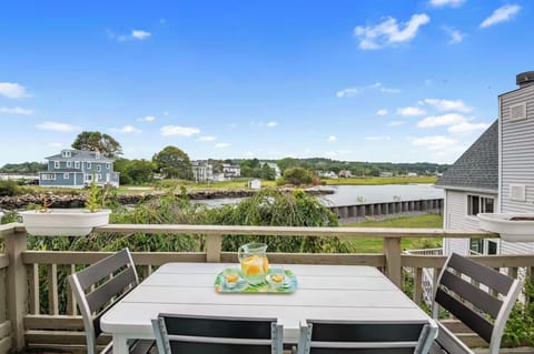 Enjoy views and meals from the private balcony overlooking the channel