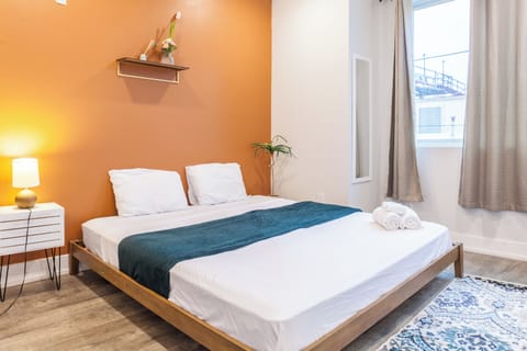 Nestle into a cozy haven in our charming bedroom, where comfort and relaxation embrace you