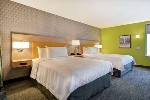Unwind into crisp linens and restful nights in comfort.