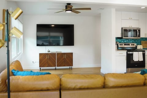 Your group will want to flock around this suite’s 75” HD Roku TV.