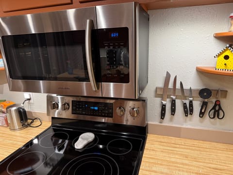 Microwave, stove and tea kettle