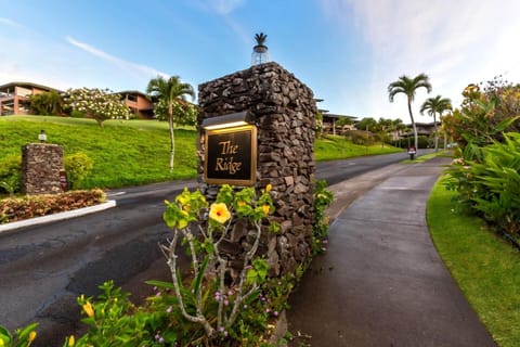 Arrive in style with a welcoming resort entrance framed by lush landscaping.