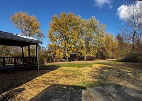 Rear yard with covered deck.