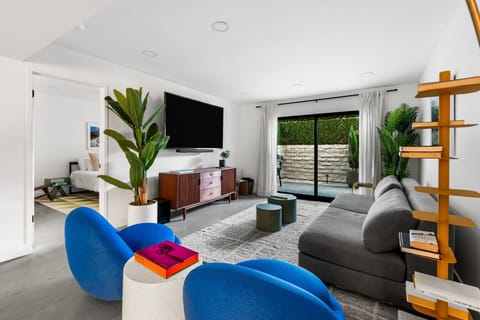 Bright and modern living area with comfy seating and plenty of space to unwind.
