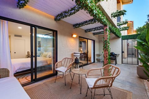 Relax and entertain on the patio, complete with seating and a grill for the perfect outdoor experience.