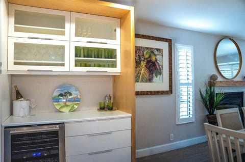 champagne, wine, and cocktail glasses with shaker for drinks