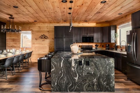 A massive kitchen island with additional seating