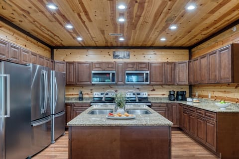 Large kitchen island with ample counter space for meal prepping.