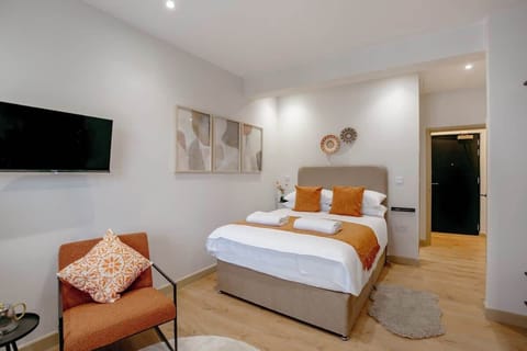 Relaxing bed with towels and fresh linens