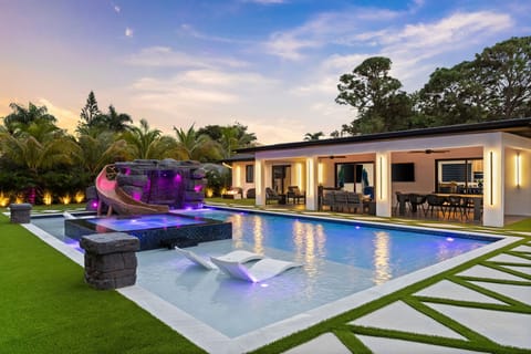 Escape to your private pool and spa at sunset