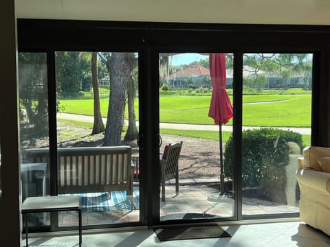 View of 8th Green and preserve from enclosed lanai