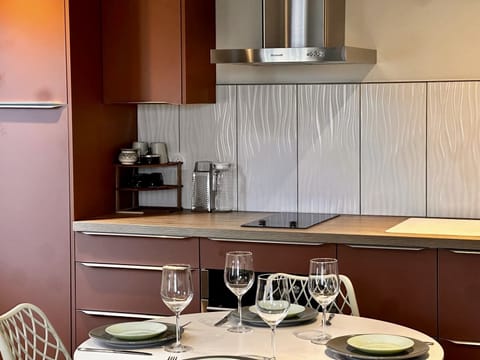 Bright kitchen with countertop and storage space.