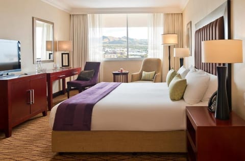 Wake up refreshed with mountain views and plush bedding.