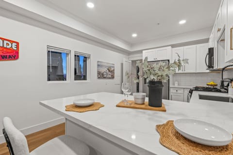 Bedroom view connecting to kitchen and common areas