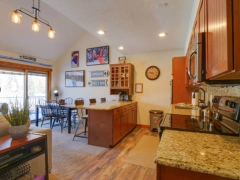 Galley kitchen and dining room.