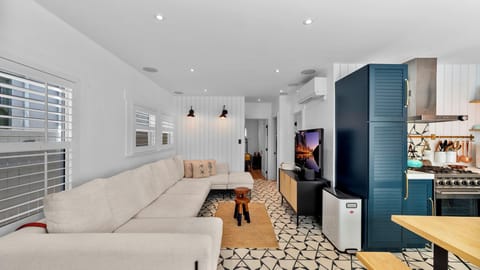 Living room opens to the kitchen