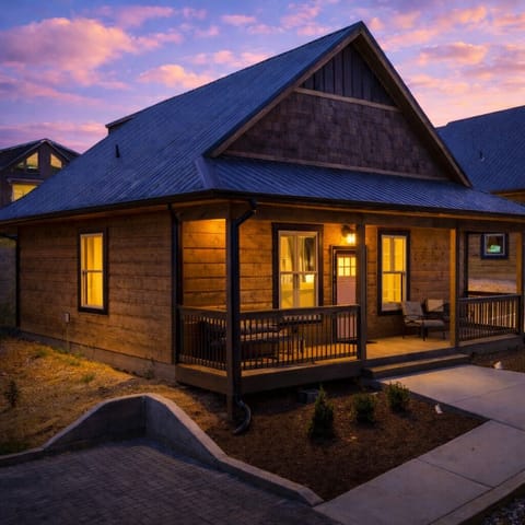Modern Pigeon Forge cabin with warm evening glow