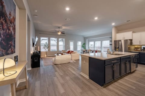Beautifully designed open-plan living with bright windows and modern finishes.