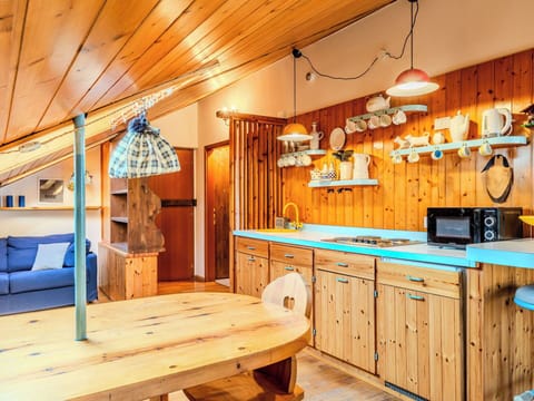 Wood, Ceiling, Interior Design, Wood Stain, Light Fixture, Room, Log Cabin, Cottage, Hardwood, Lumber