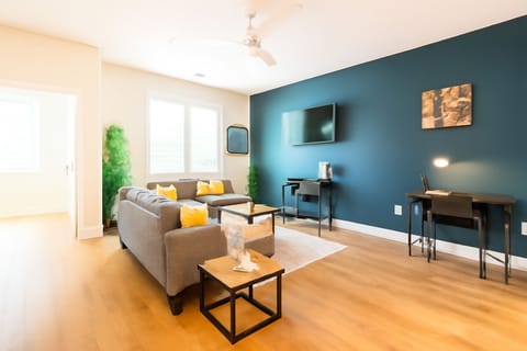 Kick back and relax in this bright, cozy living room stylish décor, comfy seating, and a Smart TV perfect for Netflix nights or lazy mornings before heading to the beach!