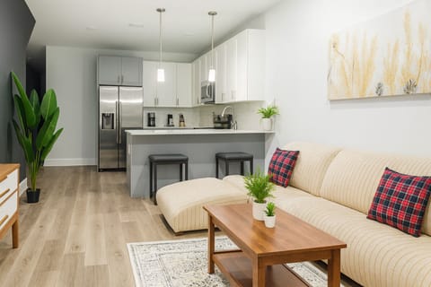 Clean, thoughtfully designed living room providing a perfect balance of comfort and style.