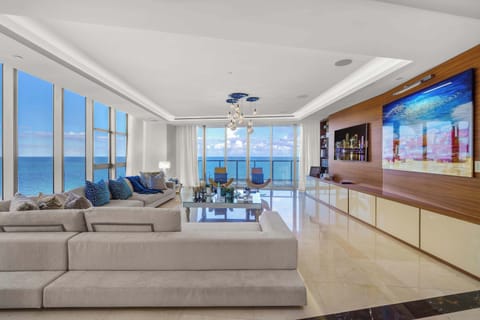 Curl up in the chic living room & stream your favorites on the smart TV​