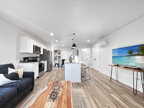 Step into your bright, modern sanctuary where sleek white finishes meet modern comfort.