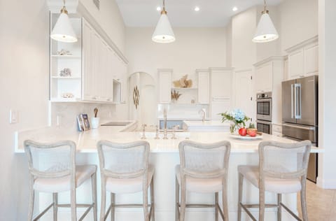 Kitchen - quartz counter tops, double ovens, new Bosch appliances, double sinks