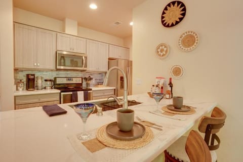 Kitchen and breakfast island with stools. 