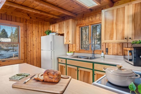 Fully stocked kitchen with coffee, tea, cookware & everything you need for easy meals.