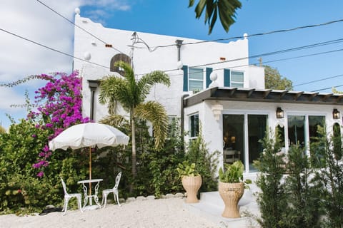 Enjoy the serene surroundings and lush plantings as you relax in our expansive garden patio.