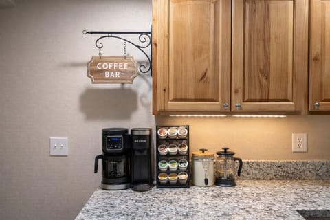 Fully stocked coffee bar with drip coffee, Keurig & assorted pods.