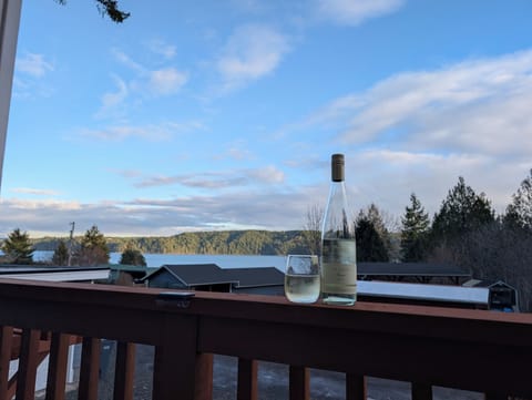 Enjoy a glass of wine while taking in beautiful Hood Canal views from the deck, 