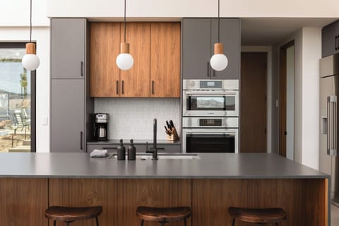 Kitchen includes drip coffee machine w/ grinder (beans included).