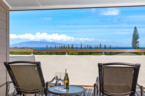 Sip morning coffee with sweeping island and ocean views from your private balcony. KGV-20T8