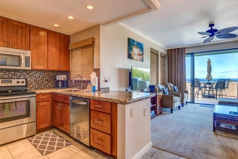 Feel the joy of preparing meals in a space that wraps you in texture, light, and a seamless connection to the ocean beyond KGV-22T5