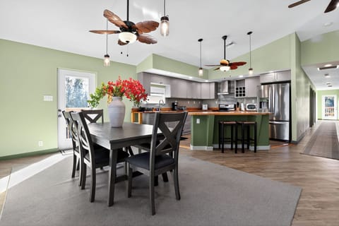 Enjoy shared meals in an open dinning space featuring natural light.